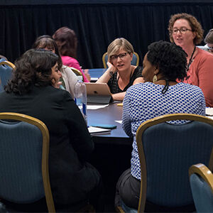 NAFA members talking at the 2019 Biennial Conference