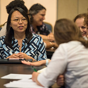 Members talking at the 2019 Biennial Conference